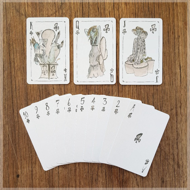 Hand Illustrated vogue fashion playing cards showing the suit of clubs.