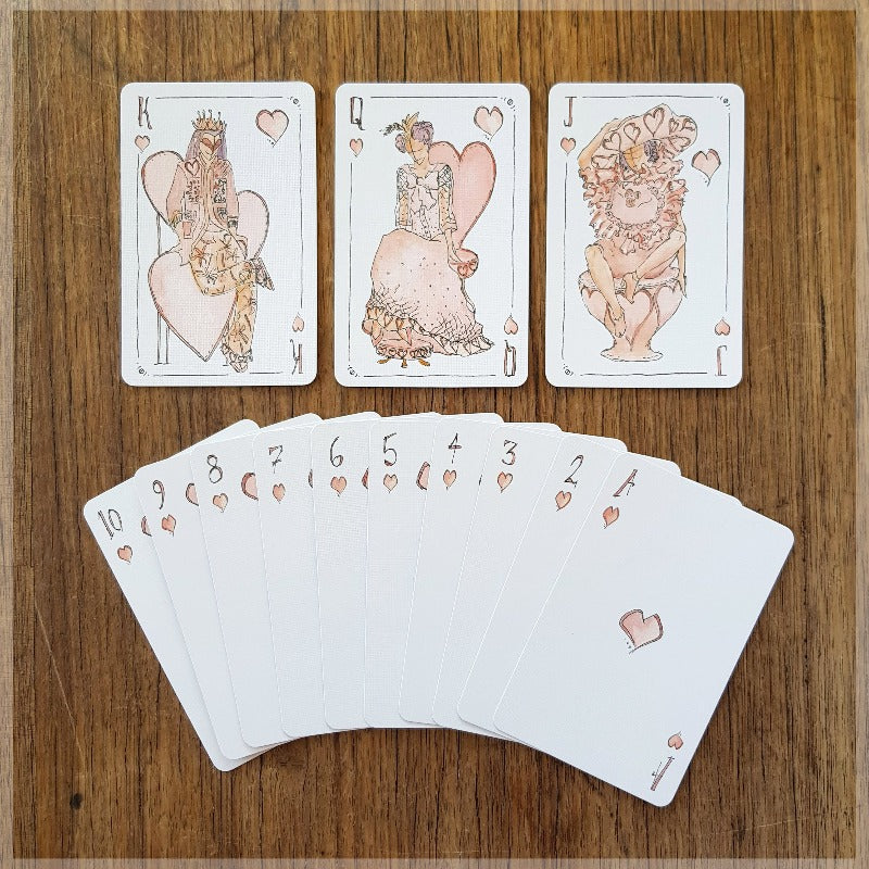Hand Illustrated vogue fashion playing cards showing the suit of hearts.
