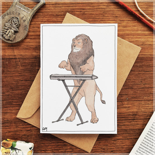 The Lion & His Keyboard - Greeting Card