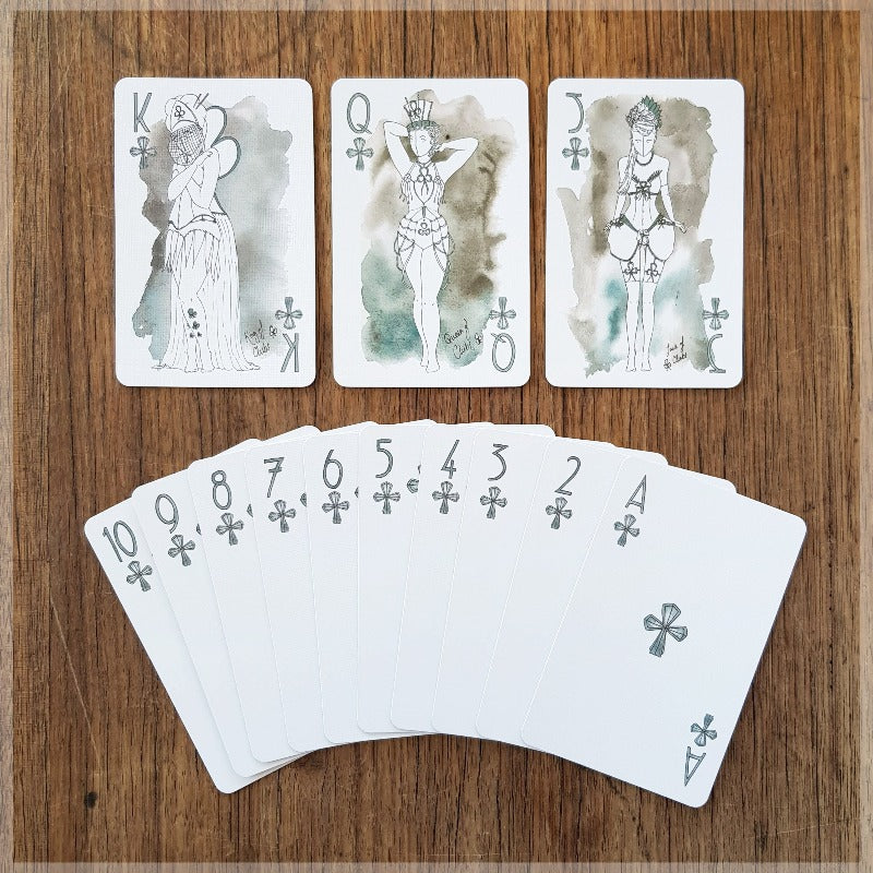 Hand Illustrated Burlesque playing cards showing the suit of clubs