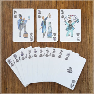 Hand Illustrated Circus playing cards showing the suit of clubs. This suit shows off the circus magicians