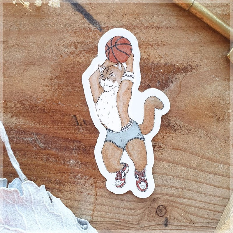 Drawing of cougar playing basketball
