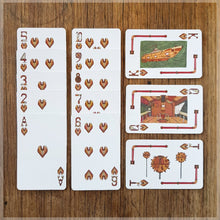 Hand Illustrated Steampunk playing cards showing the suit of hearts. The picture cards show the cockpit, its weapons and the full ship.